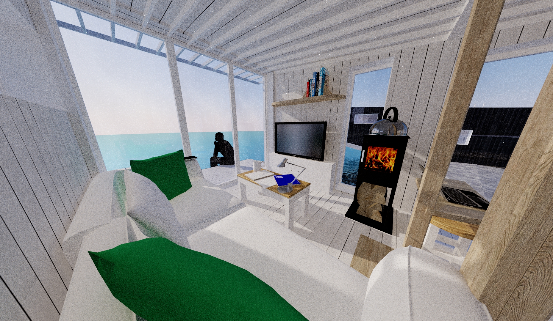 The balcony must be a relaxing place to sit and dangle your feet over the edge as you admire the sea view! Glimpses of the studio can be seen through the full-height windows.