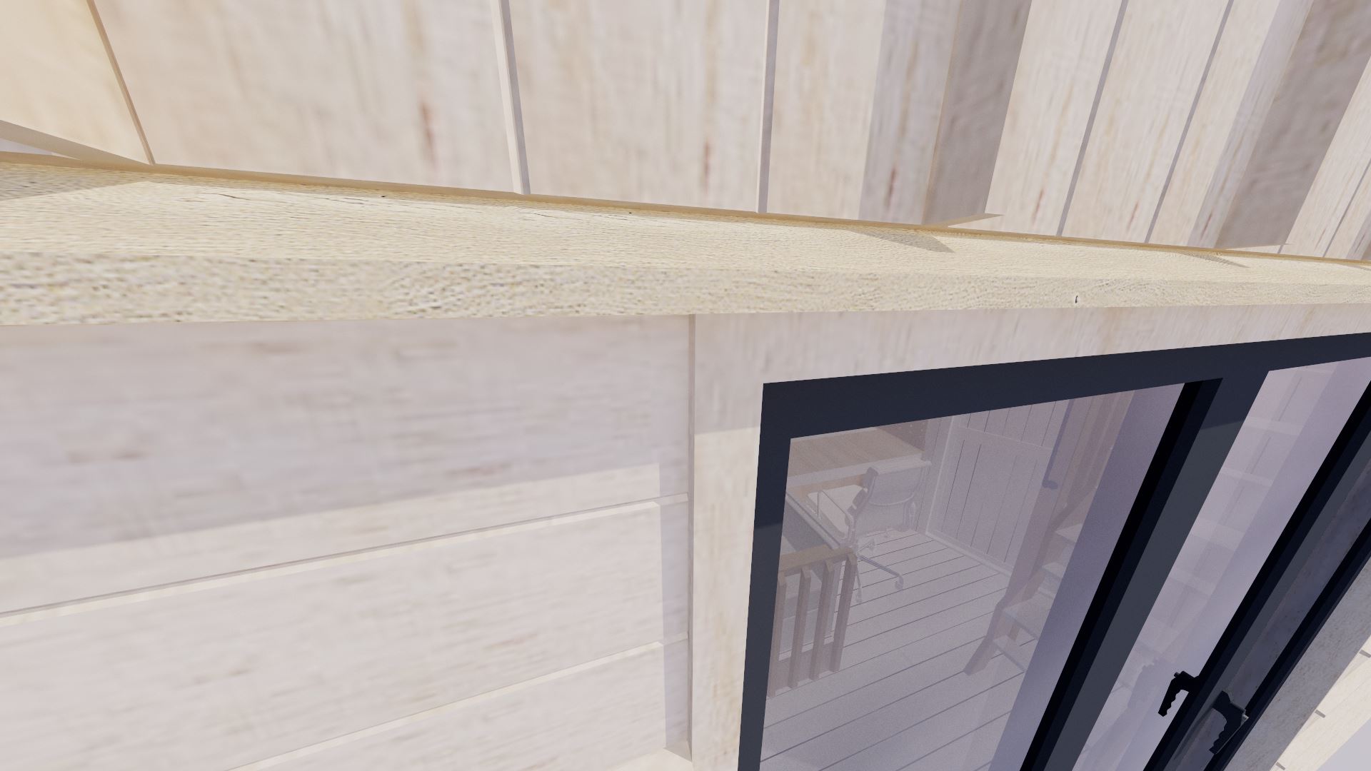 A close up of the exterior shows the board and batten cladding, along with horizontal rain strips.