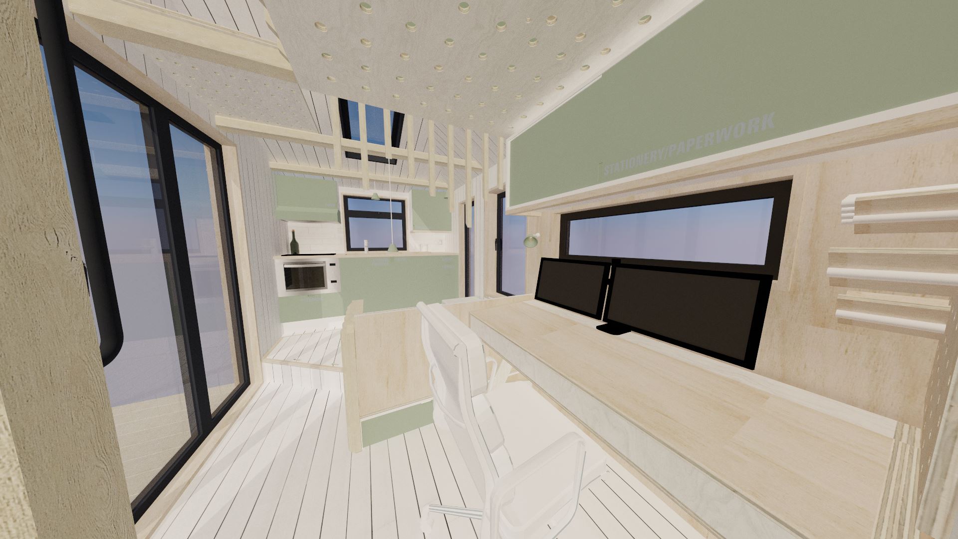 An alternate view of the workspace shows that it too gets plenty of natural light. Open plan tiny houses are really important to maximise on the space and available light.
