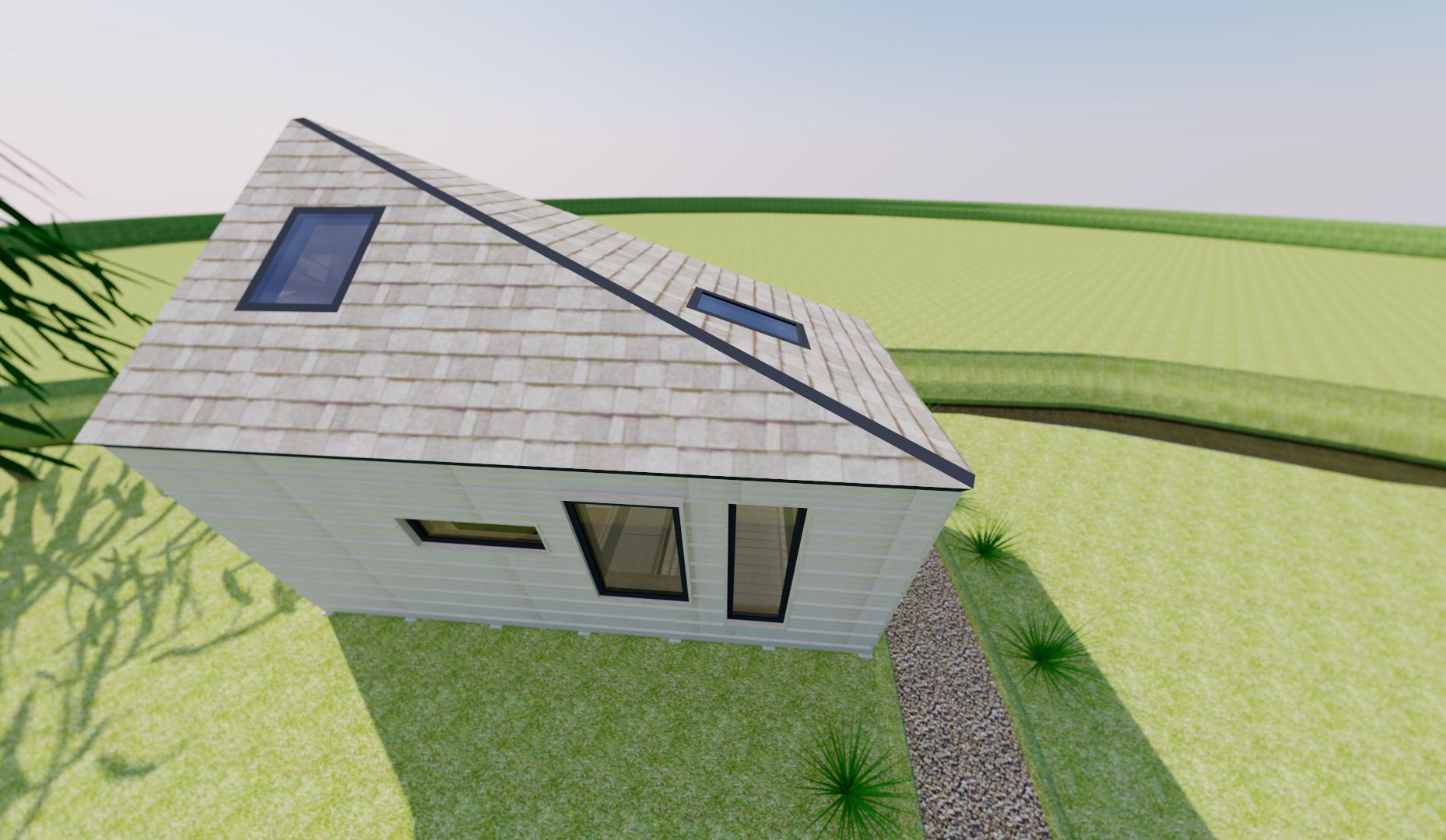 The front elevation (roadside) shows how effective the roof design is at minimising the overall impact of the building.