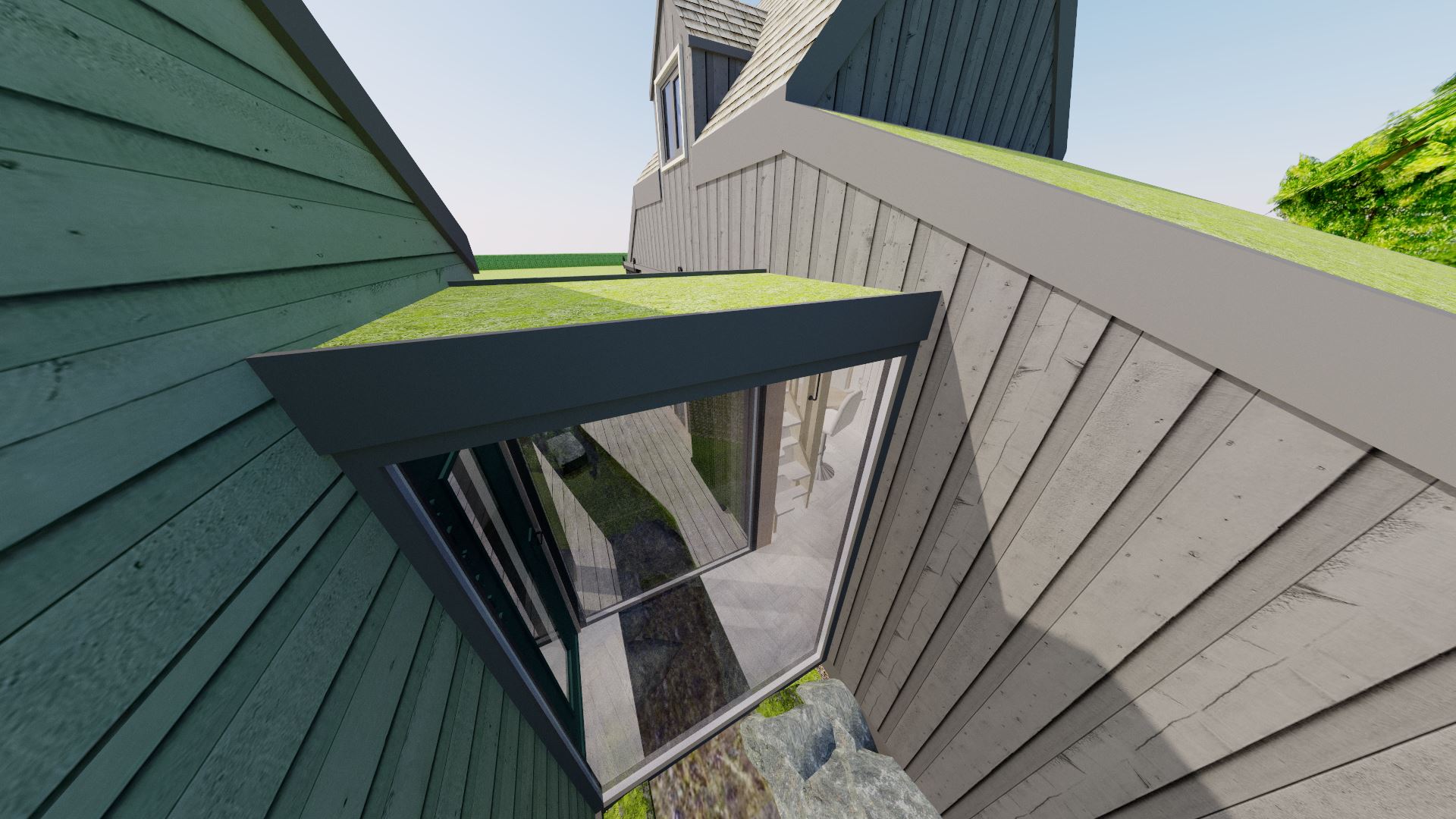 A higher exterior view of the linking section shows that it too has a green roof; helping to keep the link even more subtle.