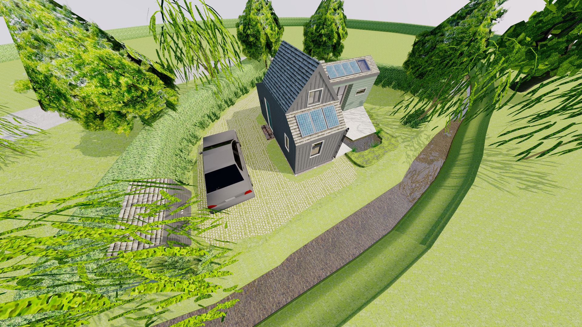 A birds-eye view of the property shows the property sits on a small plot next to a classic New Forest stream surrounded by willow trees.