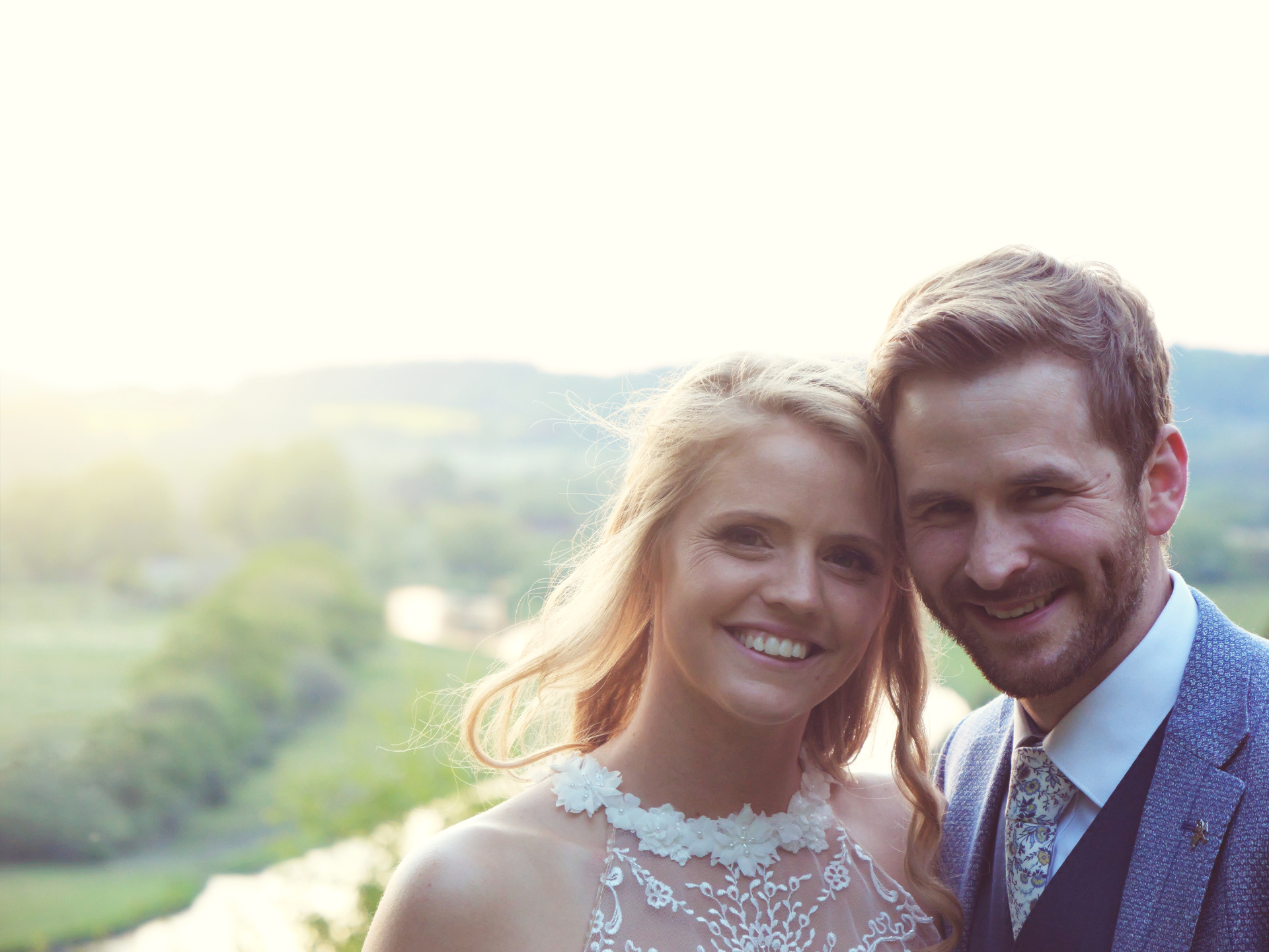 Sophie and Tom in front of a beautiful sunset.