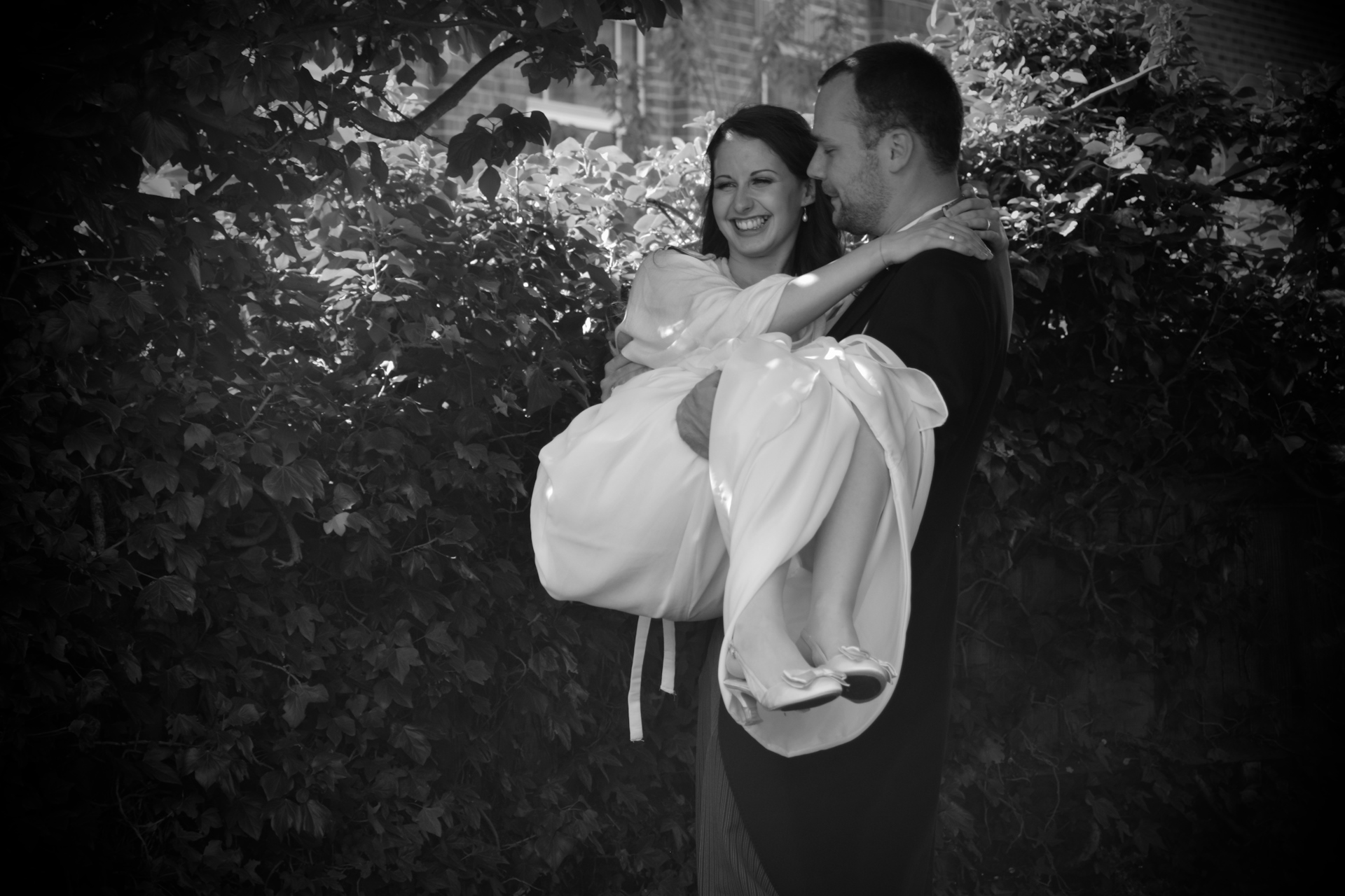 Istvan carries Vicki to the reception.